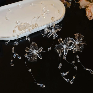 Exquisite transparent flower tassels jewelry set with crystal beads on a sleek surface