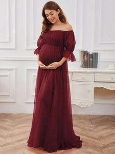 Off-shoulder burgundy tulle maternity evening gown with puff sleeves and flowing skirt