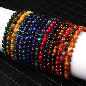 Detail of 6mm natural purple agate and multi-color tiger eye stone elastic beaded bracelets