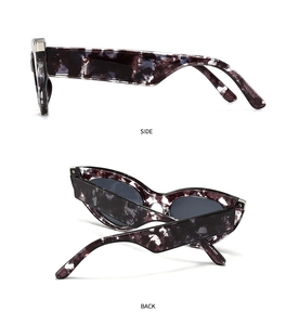 Detailed side and back view of zebra texture sunglasses with purple marble frame
