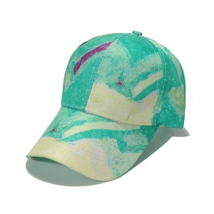 Close-up of artistic graffiti baseball cap with colorful spray-paint patterns and stitching