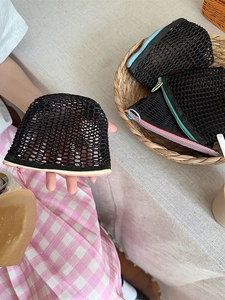 Mesh coin purse with vibrant colorful zippers and a portable keychain design