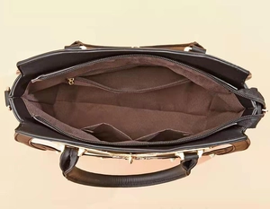 Top view of large capacity tote bag interior with zipper pocket and dual phone slots