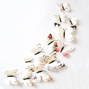 Set of 13 colorful 3D decorative butterflies arranged in a graceful arc for wall decor