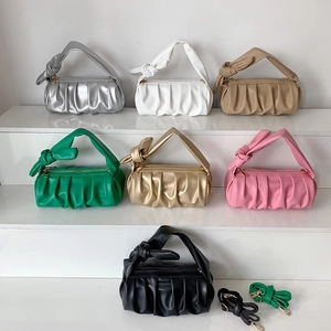 Ruched cloud bag with knotted handle in seven solid colors including silver and gold