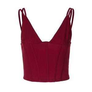 Detail view of red V-neck camisole corset top with structural stitching on white background