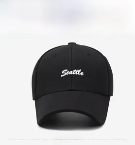 Detailed front view of black cotton baseball cap with white Seattle embroidery