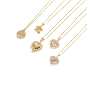 Elegant gold necklaces with heart, flower, and tree pendants featuring pink zircon and pearls