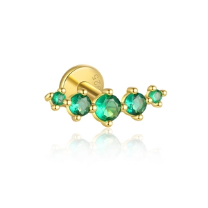 Detail of S925 sterling silver earrings with curved green zircons and golden finish