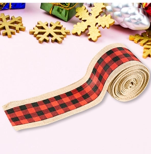 Detail of red and black checkered linen ribbon for Christmas decor and gift wrapping