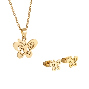 Elegant gold butterfly jewelry set with镂空necklace and matching stud earrings on white