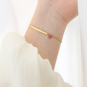 Minimalist 18K gold plated titanium bracelet with red heart charm and round beads