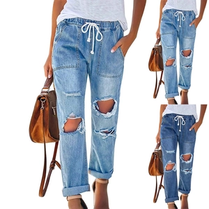 Women's ripped denim jeans with elastic drawstring waist in three classic blue washes