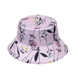 Pink floral sun hat with satin finish featuring black line art flowers and colorful buds