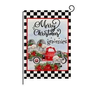 Christmas garden flag with red truck, gnomes, and black and white checkered border