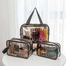 Macro view of smoky grey PVC toiletry bags with zipper and branded geometric logo
