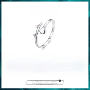 Detail view of S925 sterling silver cat ring with pink enamel ears and paw prints