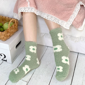Thick warm green coral fleece mid-calf socks with white flower patterns for women
