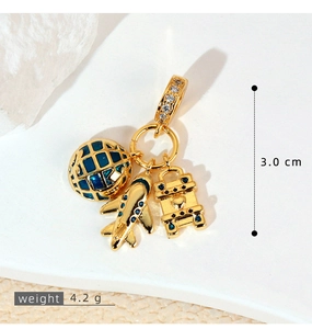 Golden travel charms with airplane, globe, and suitcase measuring 3.0 cm and 4.2 g