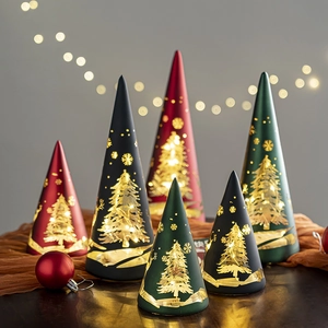 Conical Christmas tree glass lanterns with warm LED lights for festive table decoration