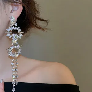 Elegant silver drop earrings with shimmering zircon fringe and sparkling rhinestones