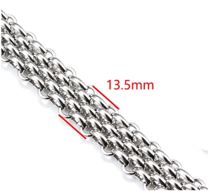 Macro detail of 13.5mm wide stainless steel Cuban chain link with silver finish