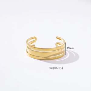 Detailed view of 19mm gold plated stainless steel cuff bracelet weighing 31.1g