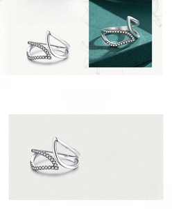 Detail of S925 sterling silver leaf ring with pavé zircon setting and irregular hollow design