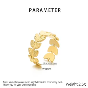 Close-up of 18K gold plated leaf ring showing 8mm width and stainless steel texture