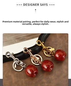 Three cherry keychains with red glitter resin and silver, rose gold, and gold metal plating