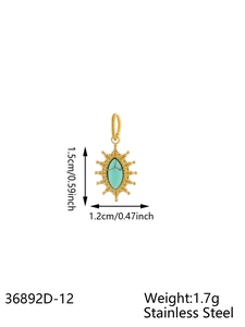 Detailed view of a gold stainless steel star pendant with a marquise turquoise stone