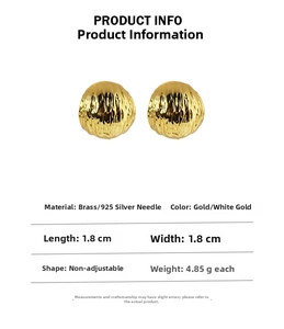 Detail showing irregular wrinkled texture of 18k gold plated brass C-shape earrings