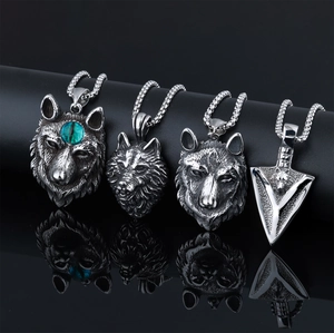 Set of four vintage punk wolf head pendants in antique finish stainless steel