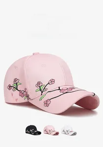 Close-up of intricate plum blossom embroidery on a premium cotton baseball cap brim