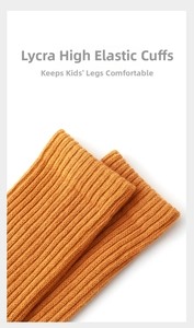 Close-up of elastic Lycra ribbed cuffs on yellow cotton socks for kids