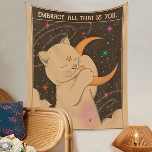 Detail of vintage cat embracing moon tapestry with 'Embrace all that is you' text