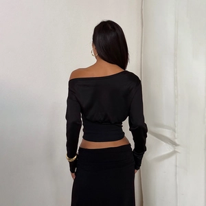 Slim fit black off-shoulder sweatshirt with long sleeves and elegant satin sheen finish