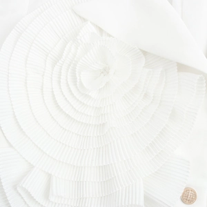 Elegant white blazer featuring a 3D pleated floral design and vintage gold button detail