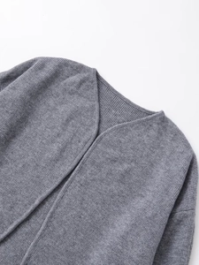 Detailed macro view of gray double-sided knit fabric and smooth seamless neckline