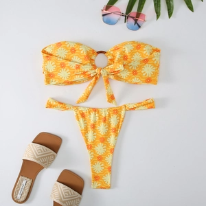 Detailed flat lay of floral bandeau bikini top with ring detail and high-cut bottom