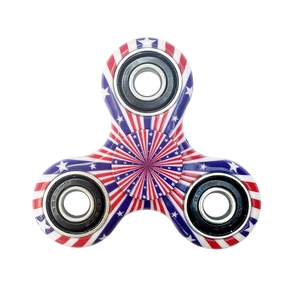 Close-up of three-leaf fidget spinner with American flag print and metal bearings