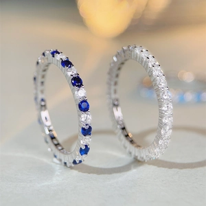 Elegant S925 silver eternity rings with blue and clear high-carbon diamond gemstones