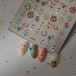 Christmas 5D embossed nail stickers featuring Santa and reindeer designs for DIY nail art