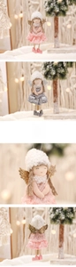 Detail of Christmas angel lace ornaments with sequins, fur hats and sparkling wings
