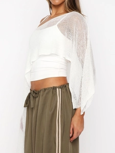 Women's white irregular sheer knit shawl poncho with loose fit and wavy draped hem