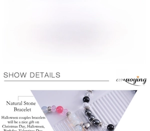 Detail view of 8mm natural stone Halloween bracelets with magnetic heart clasps and charms