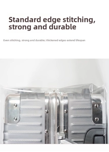 Close-up of durable PVC luggage cover with reinforced stitching on silver suitcase