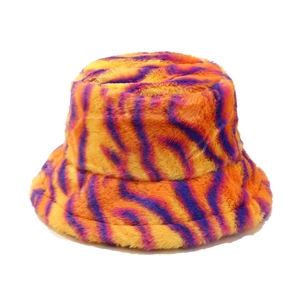 Thick plush winter bucket hat with vibrant orange and purple tiger stripe faux fur pattern