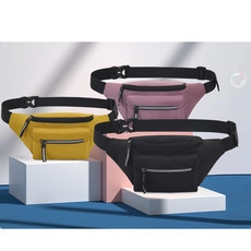 Three 400D waterproof oxford fabric waist bags in yellow, pink and black on cubes