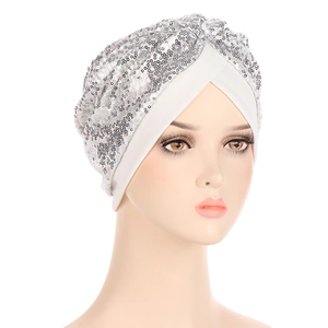 Sparkling silver sequin turban hat for women featuring a stylish twisted knot design